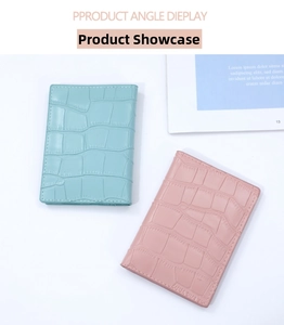 Detail of light blue and pink stone pattern faux leather card holders with fine stitching