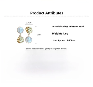 Detail view of wavy gold pearl drop earrings showing 1.4x3cm size and 4.6g weight