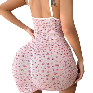 Pink floral ruched bodycon mini dress with thin straps for a sexy summer slim fit look