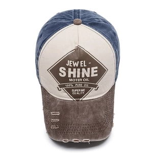 Vintage distressed baseball cap in navy and cream with embroidered patch for outdoor sun protection