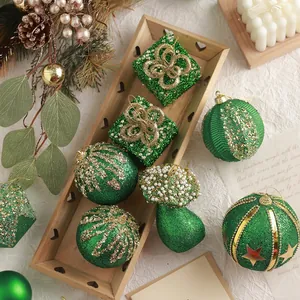 Green flocked Christmas ornaments set with mushroom and gift box shapes for tree decor
