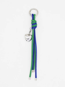 Detail of woven green and blue leather keychain with silver heart pendant and hook