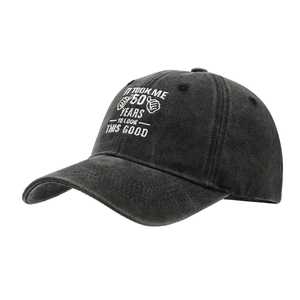 Washed cotton baseball cap featuring 50th birthday embroidery with vintage distressed texture