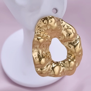 Exaggerated 18k gold plated 304 stainless steel earrings with irregular lava texture