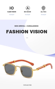 Detail view of square sunglasses with gold frame, crystal inlay and wooden temples