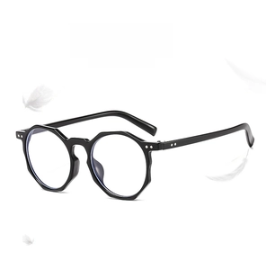 Detailed view of lightweight black polygonal glasses frame floating with white feathers
