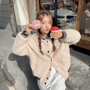 Mini pink plush earphone case for AirPods with purple lanyard and beige jacket detail