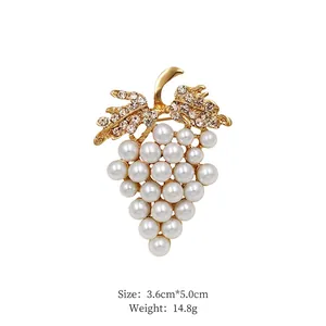 Detailed size and weight specs for the golden grape brooch with pearls and rhinestones
