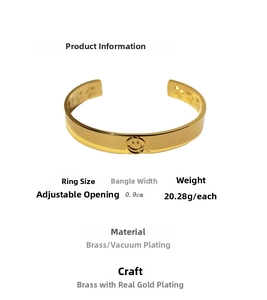Detailed view of gold plated adjustable snake chain cuff with a smile engraving
