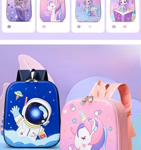 Detail of waterproof cartoon kids backpacks with unicorn and astronaut prints