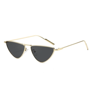 Retro pointed cat eye sunglasses with gold metal frame and dark triangular lenses