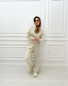 Set beige due pezzi loungewear con felpa mezza zip e pantaloni sportivi a gamba larga