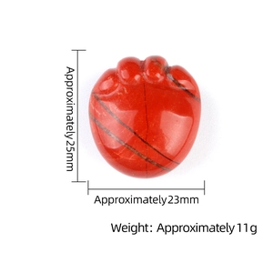 Red jasper heart paw stone carving with natural stripes and size measurement markings