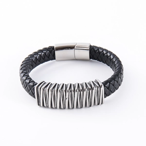 Mens black braided leather bracelet with silver stainless steel magnetic clasp on white backdrop