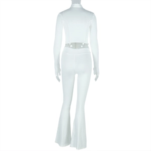 Rear view detail of white slim-fit crop top and high-waisted flared trousers in stretch fabric