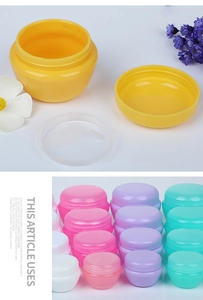 Macro shot of colorful mushroom cream jars with internal seals and screw caps