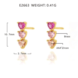 Detail view of 18k gold plated brass heart earrings with pink gradient AAA+ cubic zirconia