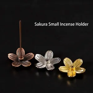 Set de 3 soportes de incienso flor de cerezo en metal, acabados cobre, plata y dorado