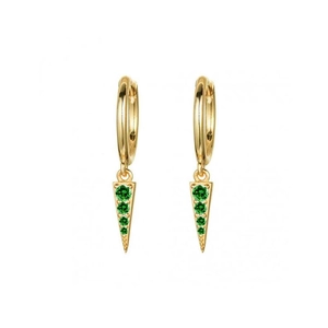 Detailed shot of golden geometric triangle drop earrings with green rhinestones