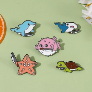 Funny ocean animal enamel pins set featuring shark, pufferfish and turtle holding knives