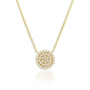 Close-up of gold plated necklace with round micro-pave pendant and clear zircon stones