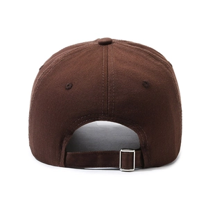 Rear view of washed dark brown baseball cap with adjustable metal buckle and cotton fabric