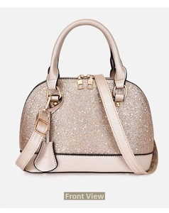 Detailed front view of champagne sequin bowling handbag with leather handles and strap