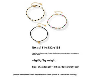 Detailed view of layered 18k gold plated anklets with colorful natural stones and beads