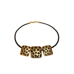 Vintage-Halskette mit Leopardenherz und goldenen Anhängern an einer schwarzen Kordel