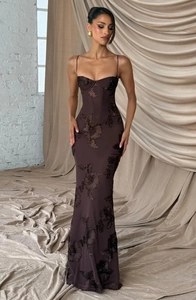 Detail of 3D floral embroidery on a chocolate brown bodycon evening gown with straps