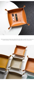 Detail showing the snap button design and foldable PU leather storage tray in multiple colors