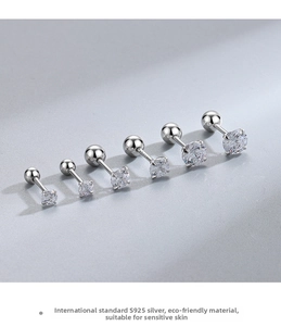 Detailed view of six pairs of S925 sterling silver screw back earrings with white zircons