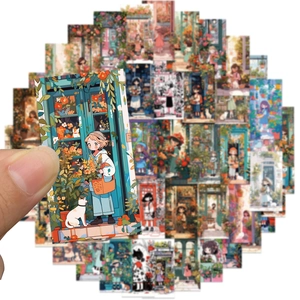 Close-up of a hand holding a cute cartoon flower girl sticker for DIY scrapbooking