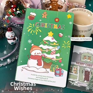 Détail d'un carnet de Noël A5 avec papier épais résistant à l'encre et motif bonhomme