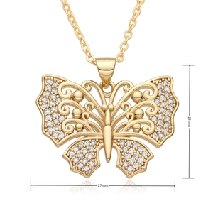 Detail showing gold butterfly pendant with white crystals, dimensions 21mm by 27mm