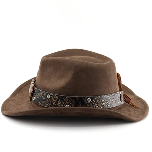 Detail of dark brown cowboy hat featuring black floral band and silver stud accents