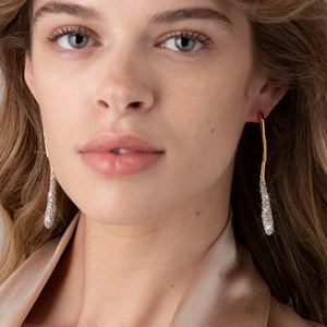 Elegant two-tone geometric drop earrings with crystals in 18k gold and silver finish