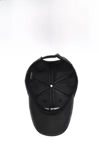 Detail of vintage baseball cap interior with breathable sweatband and metal buckle