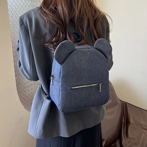 Deep blue denim backpack with cute 3D bear ears and metal zipper for casual travel
