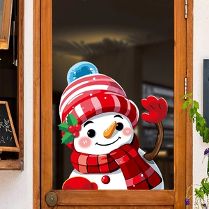 Christmas window cling featuring a cute smiling snowman with red scarf and hat on glass door
