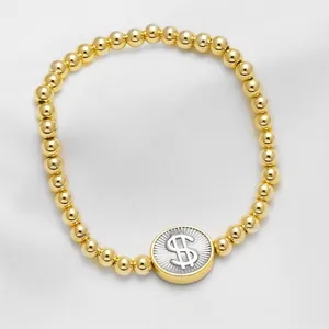 Handmade 18k gold plated 5mm beaded bracelet featuring a silver dollar sign coin charm