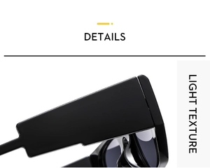 Close-up of sleek black wide-arm sunglasses featuring a premium polished glossy texture