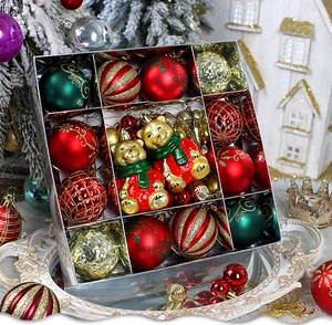 Assorted Christmas ball set with glitter patterns and gold bear ornaments in a gift box
