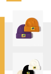 Detailed view of ribbed knit beanies with yellow 091 patch in multiple colors