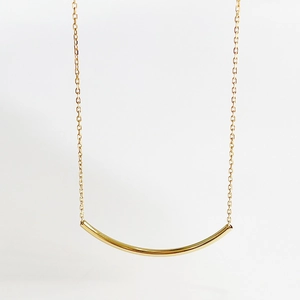 Minimalist 925 sterling silver necklace with a polished gold curved tube pendant