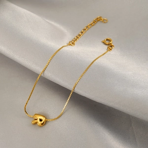 Polished gold stainless steel letter R pendant bracelet with adjustable extension chain