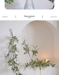 Detailed view of artificial Christmas greenery with white berries for festive wall decoration