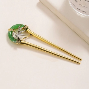 Eleganter goldener U-förmiger Haarnadel mit grünen Bambusblättern und funkelnden Steinen