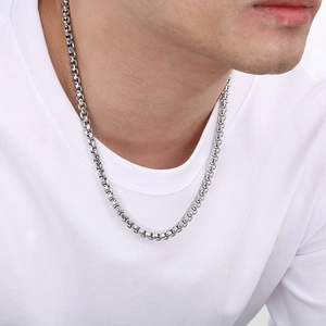 Silver stainless steel box chain necklace for men shown on neck for realistic fit