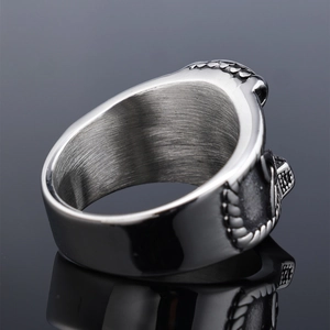 Polished silver Thor's Hammer knot ring made of stainless steel with a brushed inner finish